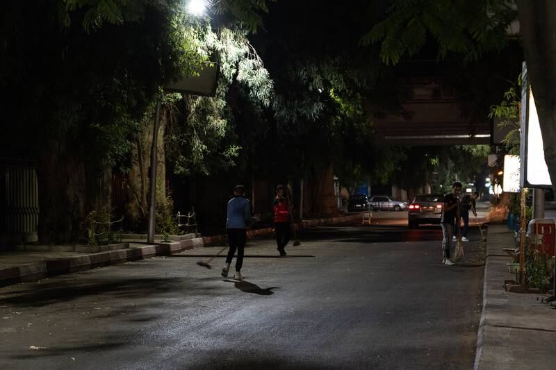 Al Jazira Walking Academy makes sweeping the street part of its training. Mahmoud Nasr / The National
