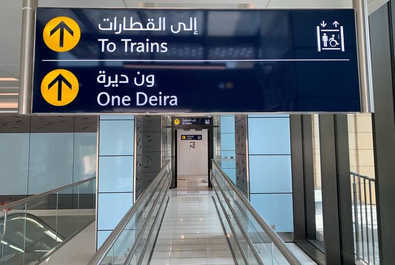 Signs for One Deira Plaza at the Gold Souq Metro Station.