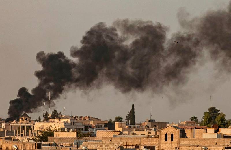 Smoke billows following Turkish bombardment on Syria's northeastern town of Ras al-Ain in the Hasakeh province along the Turkish border. AFP