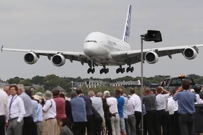 An Airbus A380 comes into land after putting on a performance for the crowds at Farnborough Airshow in 2014.