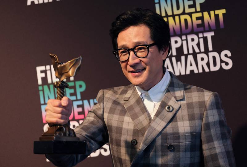 US-Vietnamese actor Ke Huy Quan holds the Best Supporting Performance award for Everything Everywhere All at Once, during the 38th Film Independent Spirit Awards in Santa Monica. AFP