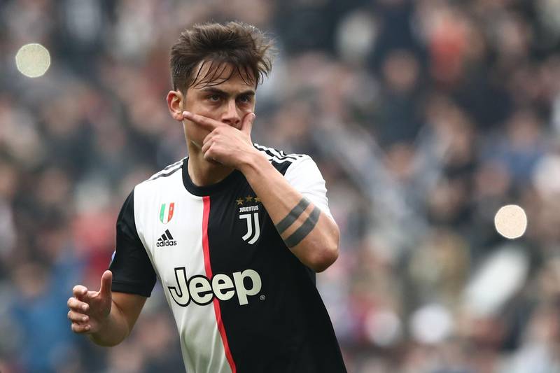 Juventus' Argentine forward Paulo Dybala celebrates after opening the scoring during the Italian Serie A football match Juventus vs Brescia on February 16, 2020 at the Juventus stadium in Turin. / AFP / Isabella BONOTTO
