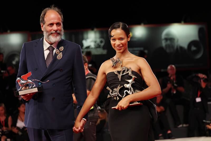 Luca Guadagnino, left, received with the Silver Lion for Best Director Taylor Russell, right, won the Marcello Mastroianni Award for Best New Young Actress for 'Bones And All'. Getty Images