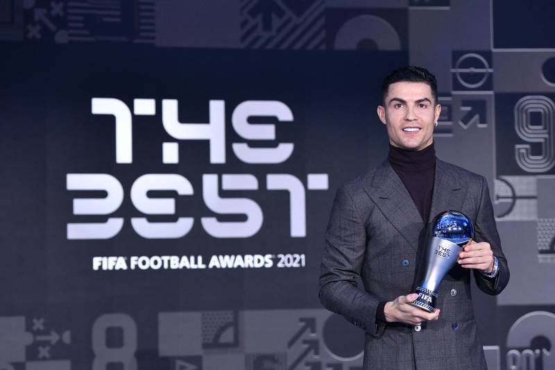 Portuguese striker Cristiano Ronaldo receives the FIFA Special Best Men Award 2021 for breaking the international goals scored record. AFP