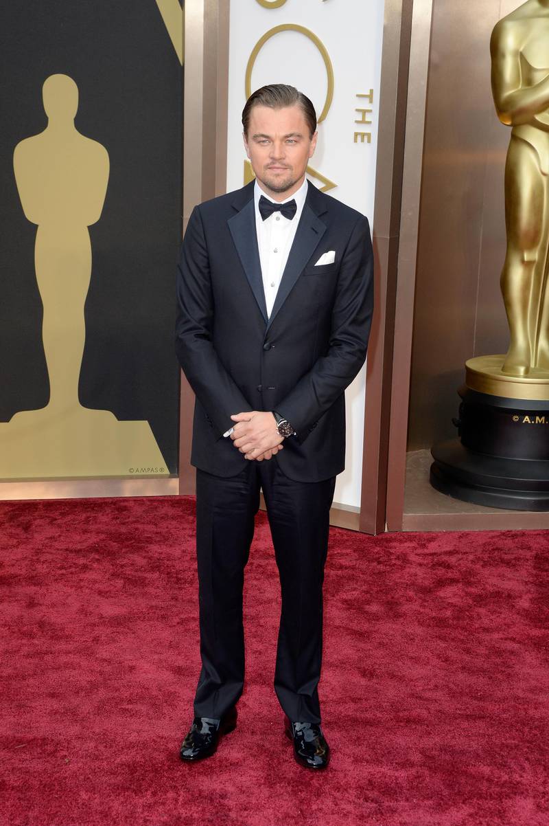 epa04107170 US actor Leonardo DiCaprio arrives for the 86th annual Academy Awards ceremony at the Dolby Theatre in Hollywood, California, USA, 02 March 2014. The Oscars are presented for outstanding individual or collective efforts in up to 24 categories in filmmaking.  EPA/MIKE NELSON
