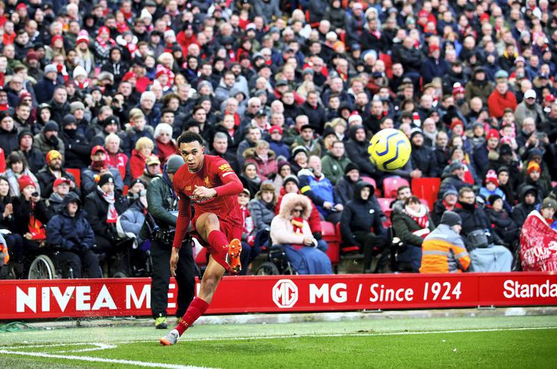 LIVERPOOL, ENGLAND - DECEMBER 14: Trent Alexander-Arnold of Liverpool takes a corner during the Premier League match between Liverpool FC and Watford FC at Anfield on December 14, 2019 in Liverpool, United Kingdom. (Photo by Clive Brunskill/Getty Images)