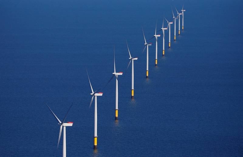 Wind turbines off the coast of the UK. Globally, offshore wind capacity doubled in 2021, according to Rystand Energy. Reuters