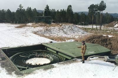 A Russian strategic nuclear forces officer inspects a launching tube in Drovjanaja, Siberia, in 1992. AFP