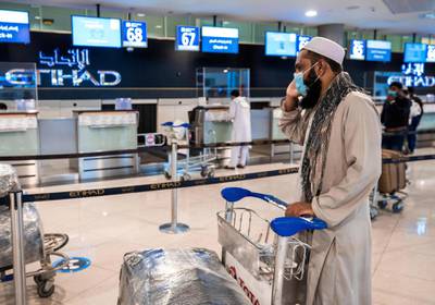Abu Dhabi, United Arab Emirates, July 8, 2020.   Abu Dhabi International Airport Media Tour by Etihad.  Passengers at the Etihad Check-In area.Victor Besa  / The NationalSection:  NA Reporter: