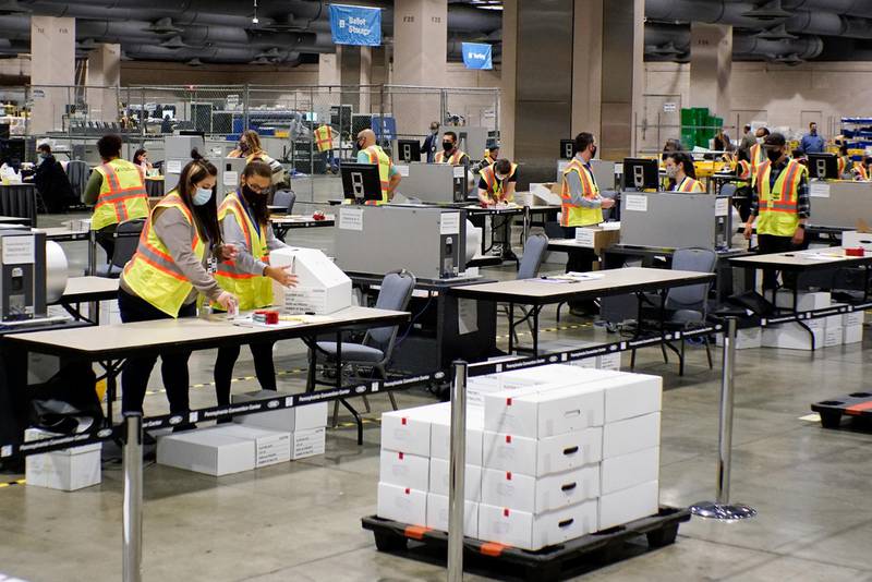 Electoral workers count ballots in Philadelphia, Pennsylvania. Reuters