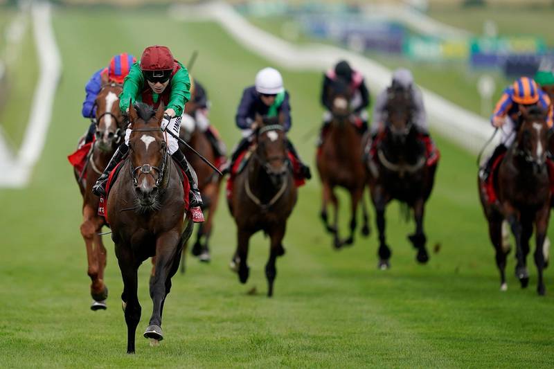 NEWMARKET, ENGLAND - JULY 11: Jamie Spencer riding Spanish Mission (green) win The Bahrain Trophy Stakes at Newmarket Racecourse on July 11, 2019 in Newmarket, England. (Photo by Alan Crowhurst/Getty Images)
