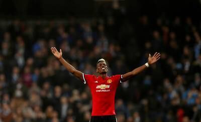 FILE PHOTO: ON THIS DAY -- April 7  April 7, 2018     SOCCER - Manchester United midfielder Paul Pogba celebrates after his match-winning display against rivals Manchester City at the Etihad Stadium.     City needed victory to be crowned Premier League champions but Pogba scored two goals in two second-half minutes to help United draw level at 2-2, before a Chris Smalling volley completed a dramatic turnaround.     United were beaten 1-0 by West Bromwich Albion in their next Premier League match, resulting in City becoming champions with five games to spare.  REUTERS/Russell Cheyne/File Photo