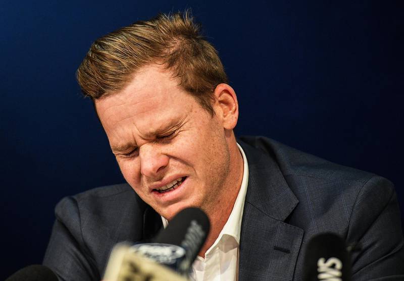 epaselect epa06635392 Former Australian cricket captain Steve Smith reacts during a press conference after arriving at Sydney International Airport, Australia, 29 March 2018. Australian captain Steve Smith and vice-captain David Warner were each banned for 12 months by Cricket Australia after an investigation into the attempted ball tampering during the Third Test against South Africa.  EPA/BRENDAN ESPOSITO AUSTRALIA AND NEW ZEALAND OUT