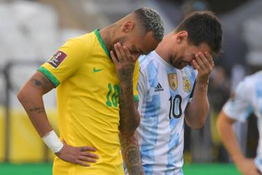(FILES) In this file photo taken on September 5, 2021, Brazil's Neymar (L) and Argentina's Lionel Messi talk before their South American qualification football match for the FIFA World Cup Qatar 2022 at the Neo Quimica Arena, also known as Corinthians Arena, in Sao Paulo, Brazil.  - The friendly that Brazil and Argentina were going to play on June 11 in Australia as part of the preparation for the Qatar-2022 World Cup was cancelled, the Brazilian Football Confederation (CBF) reported on May 11, 2022.  (Photo by NELSON ALMEIDA  /  AFP)