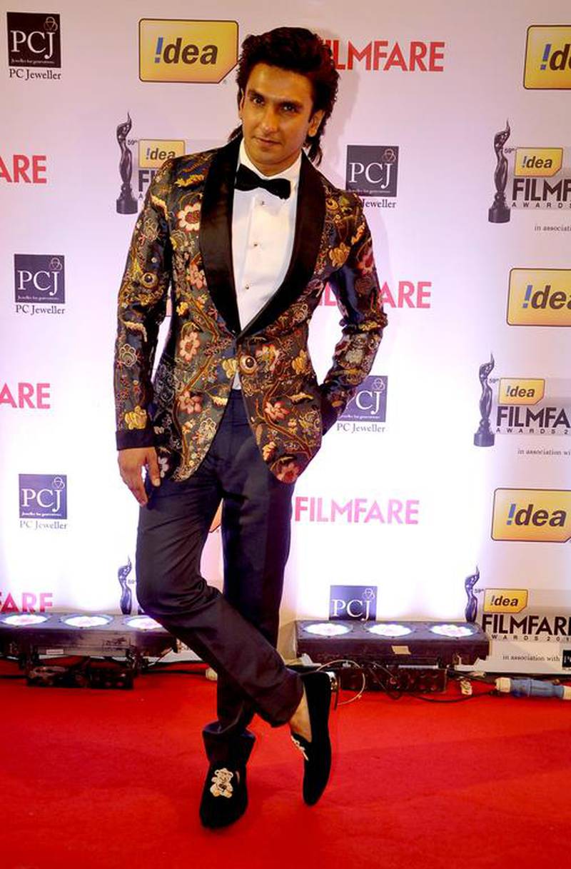Ranveer Singh, in a floral jacquard blazer, at the 59th Idea Filmfare Awards in Mumbai on January 24, 2014. IANS