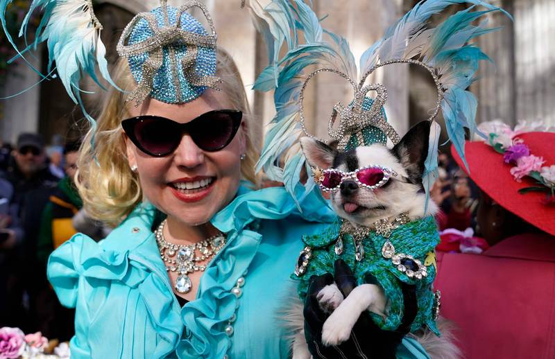 Summer Strand and her dog during the annual Easter Parade and Bonnet Festival in New York. AFP