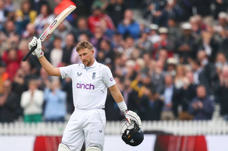 England's Joe Root celebrates after reaching hi century and 10,000 runs in Test cricket during the Lord's Test against New Zealand on Sunday, June 5, 2022. AFP