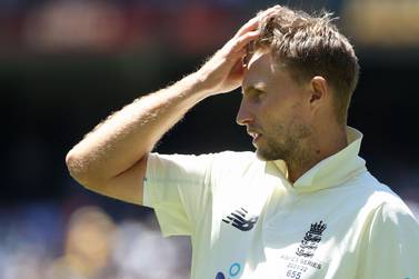 (FILES) In this file photo taken on December 28, 2021 England's captain Joe Root reacts after the Australia's victory in the third Ashes cricket Test match between Australia and England in Melbourne.  - Joe Root resigned as England's Test captain on Friday, April 15, after a rollercoaster five-year term that ended in a torrid run of results including an Ashes drubbing and defeat in the West Indies.  (Photo by Hamish Blair  /  AFP)  /  -- IMAGE RESTRICTED TO EDITORIAL USE - STRICTLY NO COMMERCIAL USE --