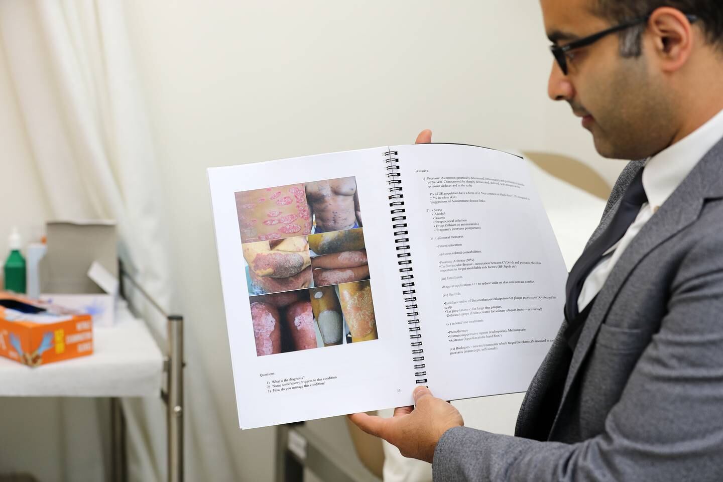 Dr Haider Ali spent a year creating his own guide, featuring 35 cases, with pictures of how they look side by side in white and darker skin, alongside a description of how to manage the condition. Chris Whiteoak / The National