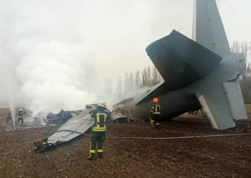 Rescuers at the crash site after a Ukraine armed forces Antonov aircraft  was shot down in Kiev, according to the Ukrainian authorities. Reuters