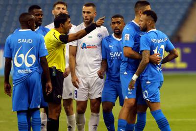 The referee gestures to Hilal's Brazilian forward Neymar following a foul. AFP