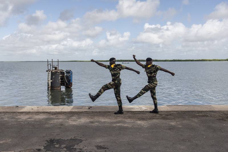 Members of the Senegalese armed forces march during a ceremony on the 20th anniversary of the capsizing of the 'Le Joola' ferry, known as the largest civil maritime disaster, as 1,863 were reported dead and missing. AFP