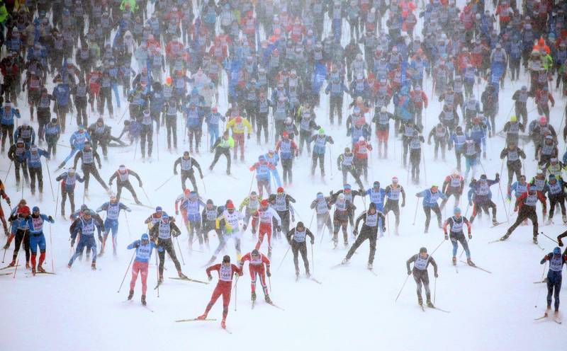 Athletes take part in the traditional mass cross-country skiing race 'Ski-Track of Moscow' during heavy snowfall in Khimki, outside Moscow, Russia. Maxim Shipenkov / EPA