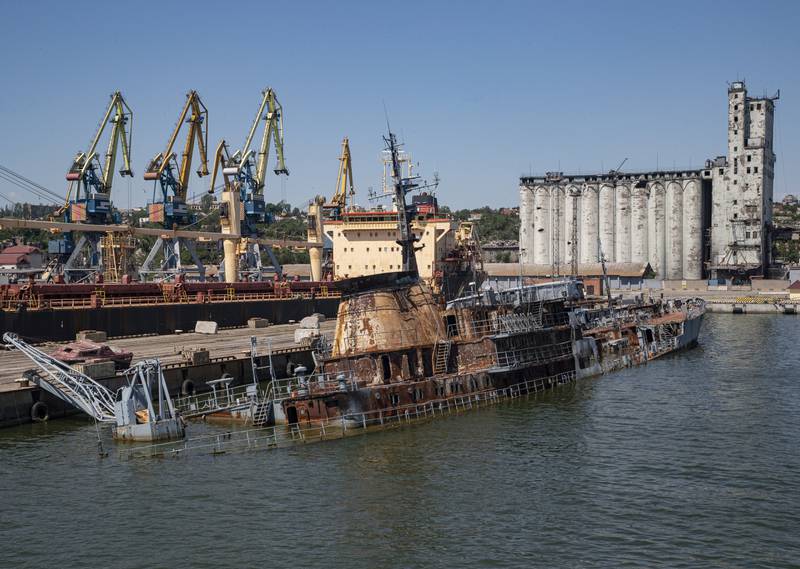 A damaged Ukrainian navy ship, the 'Donbas', lies partially submerged near the pier in the port city of Mariupol. EPA