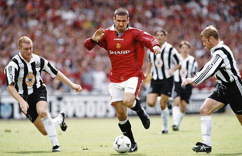 LONDON, UNITED KINGDOM - AUGUST 11:  Manchester United player Eric Cantona (c) beats Steve Watson and David Batty (r) during the FA Charity Shield match between Manchester United and Newcastle United at Wembley Stadium on August 11, 1996 in London, England. (Photo by Shaun Botterill/Allsport/Getty Images)