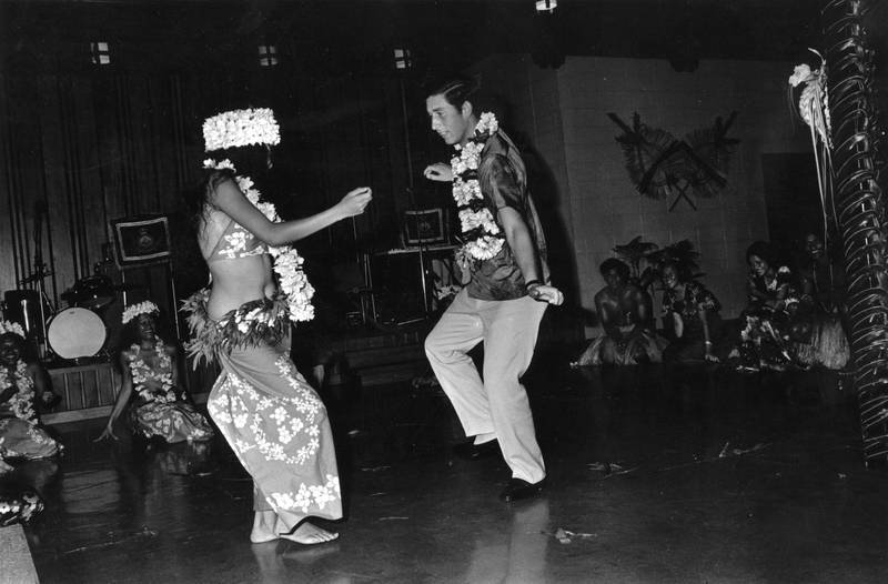 Prince Charles dances with a woman at a social function held in his honour during a royal tour of Fiji in 1974. Here, 'The National' looks back at the Prince of Wales's tours through the years. All photos: Getty Images