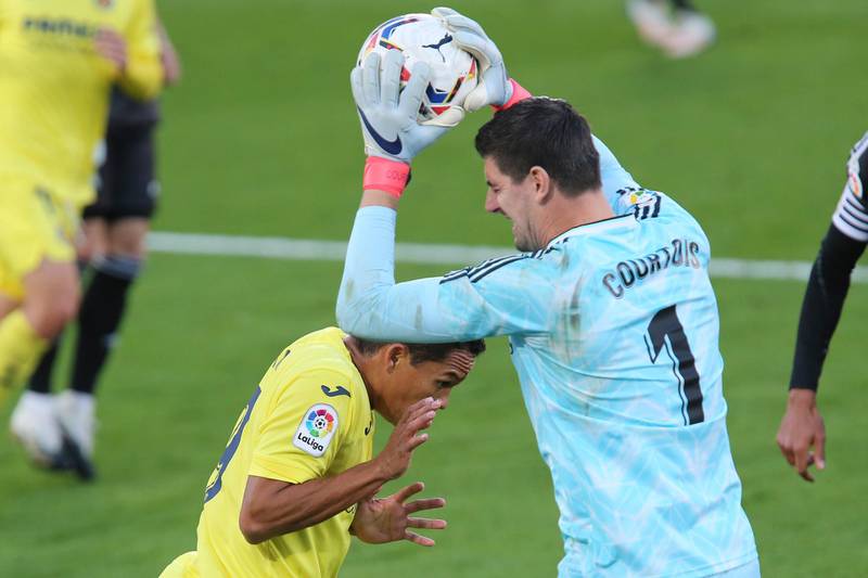 Real Madrid's goalkeeper Thibaut Courtois collects the ball ahead of Villareal's Carlos Bacca. AP