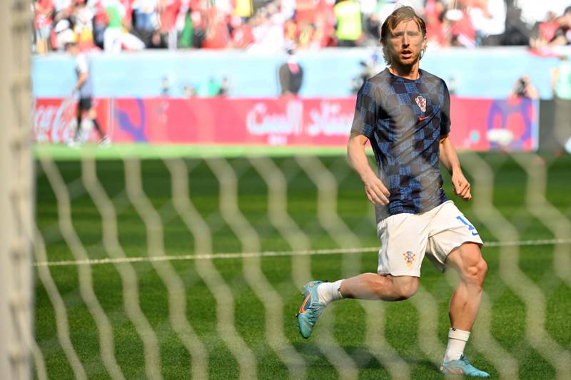 Croatia's star midfielder 10 Luka Modric warms up ahead of the Group F match against Morocco. AFP