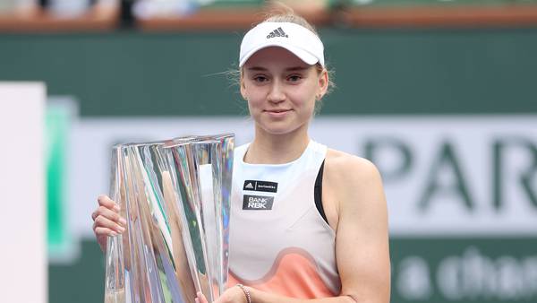 Elena Rybakina poses with the Indian Wells trophy after defeating Aryna Sabalenka in the final. Getty