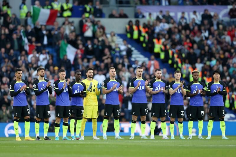 Tottenham players take part in a minute's applause in memory of former  itness coach Gian Piero Ventrone. Getty