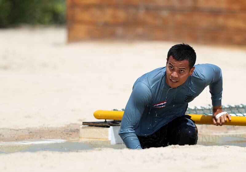 The Royal Thai Police take part in the obstacle course at the UAE SWAT Challenge in Dubai. Chris Whiteoak / The National