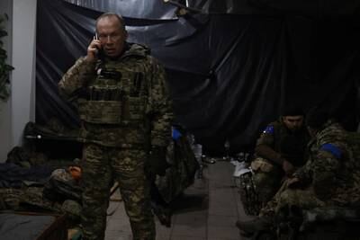Col Gen Oleksandr Syrskyi, commander of Ukraine's ground forces, visits his troops on the frontline in Soledar, Donetsk. Reuters