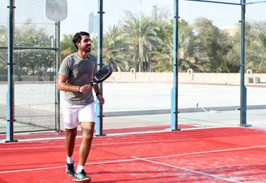 Naser Al Ketbi, an Emirati padel player while training at the Abu Dhabi Country Club. The 23-year-old lost 34 kilogrammes in less than a year in 2017. Khushnum Bhandari / The National.