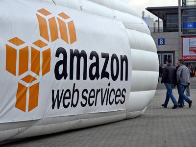 epa07269321 (FILE) - Trade fair visitors pass an inflatable stand promoting amazon web services at the CeBIT computer show in Hanover, Germany, 16 March 2016 (reissued 08 January 2019). Reports on 08 January 2019 state Amazon has reached the world's most valuable company status at the close of US stock markets on Monday, 07 January 2019. Amazon eclipsed Microsoft's market value of 789 billion USD and rose to the top of list with 797 billion USD in market value.  EPA-EFE/MAURITZ ANTIN *** Local Caption *** 54881640