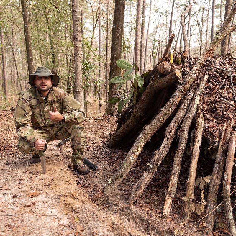 Survival training involves learning to use resources to build fires and shelter.