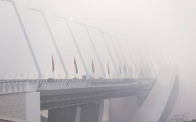 Abu Dhabi, United Arab Emirates, September 22, 2020.  The Sheikh Zayed Bridge is engulfed by fog on a Tuesday morning.Victor Besa/The NationalSection:  Standalone/Weather
