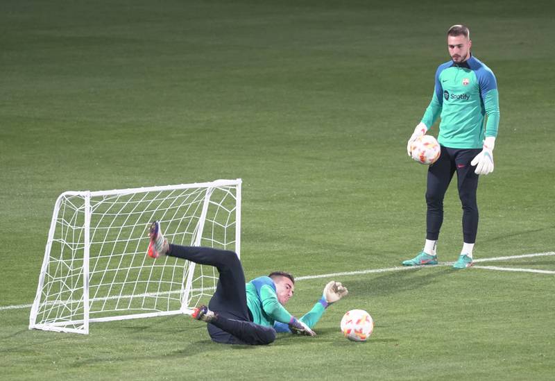 Barcelona goalkeepers Arnau Tenas and Inaki Pena during training. Reuters