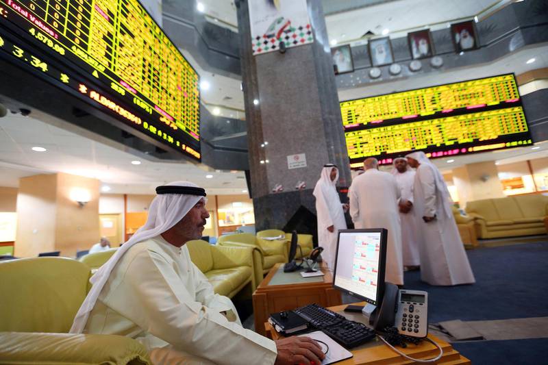 An investor monitors a screen displaying stock information at the Abu Dhabi Securities Exchange June 25, 2014. The spectacular rise and fall of Arabtec, Dubai's most heavily traded stock, teaches hard lessons about how risky the region remains for investors even as its rapid economic growth lures billions of dollars in fresh funds from abroad. Wild trading by local retail investors who dominate activity, plus weak corporate disclosure and a hands-off approach by regulators, can make a toxic mix, and on occasion destabilise entire markets.  REUTERS/Stringer  (UNITED ARAB EMIRATES - Tags: BUSINESS) - GM1EA6P1SB001