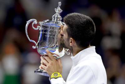 Novak Djokovic kisses the US Open trophy after defeating Daniil Medvedev in the final. Getty