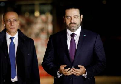 Saad Al Hariri, who announced his resignation as Lebanon's prime minister from Saudi Arabia, is seen at the grave of his father, assassinated former Lebanese prime minister Rafik Al Hariri, in downtown Beirut. Jamal Saidi / Reuters