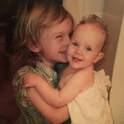 Proof that she is a natural blonde, Billie Elish shared this photo of her baby self with her older brother, Finneas. Instagram / Billie Eilish