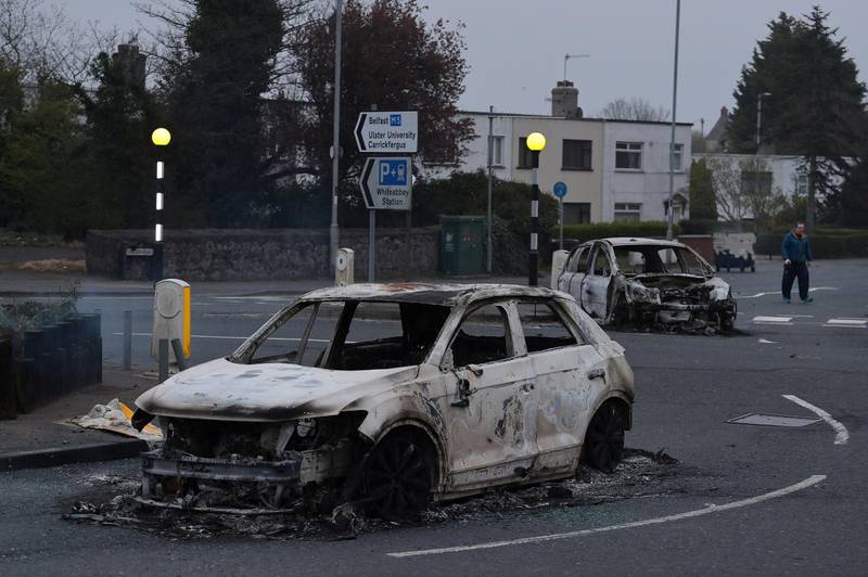 BELFAST, NORTHERN IRELAND - APRIL 04: Burnt out cars can be seen at the Cloughfern roundabout junction following overnight Loyalist violence on April 4, 2021 in Belfast, Northern Ireland. Loyalist unrest and disorder in the province continues as a result of the implementation of the so called Irish sea border. (Photo by Charles McQuillan/Getty Images)
