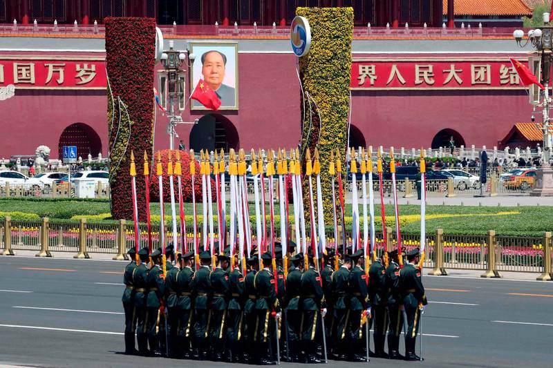 TOPSHOT - Honour guards prepare for a welcoming ceremony for Mongolia's President Khaltmaagiin Battulga at the Great Hall of People in Beijing on April 25, 2019. Leaders from 37 countries have been converging in Beijing for the Belt and Road Forum on April 25, hoping to grab a piece of the 1 trillion USD pie to improve their infrastructure. / AFP / POOL / Kenzaburo FUKUHARA
