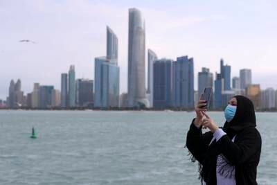 Cloudy skies and windy weather greet visitors at the Corniche, Abu Dhabi. Khushnum Bhandari / The National