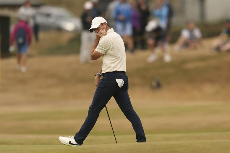 Rory McIlroy reacts after missing a birdie putt on the 14th hole during the final round of the Open. AP