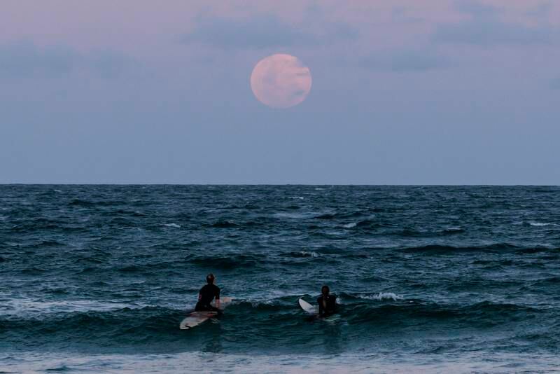 The full moon rises at Manly Beach, before a total lunar eclipse in Sydney in Sydney, Australia. Getty Images